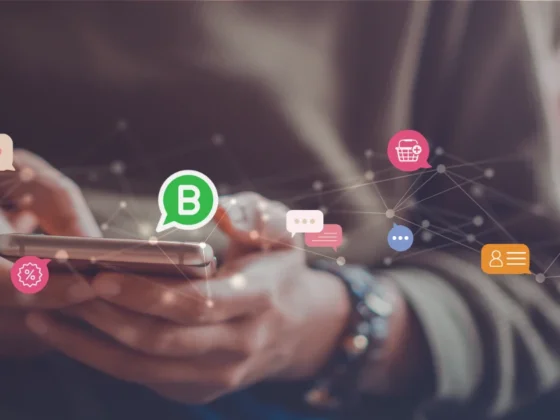 Person using a smartphone with floating icons representing messaging, loyalty, shopping, and customer engagement, highlighting business messaging connections.